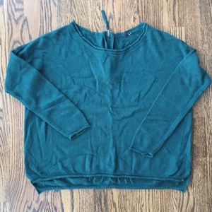 Dark green sweater with back zipper detail